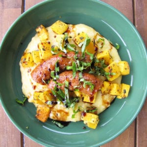 Roasted Sage Butternut Squash and Sausage on Parmesan Polenta with Balsamic Reduction