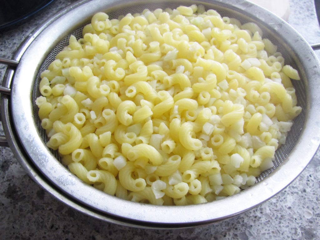 Cooked elbow mac with cauliflower pearls