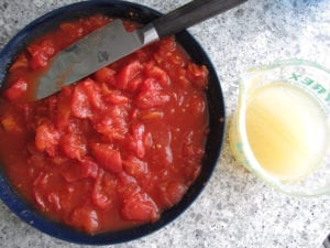 Diced stewed tomatoes and broth