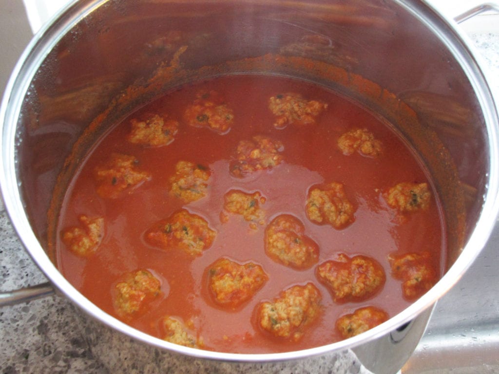 Soup with the cooked meatballs