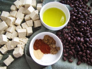 Tofu and black beans with seasonings and olive oil