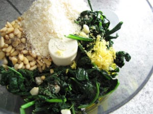 Kale Pesto Ingredients in Food Processor Ready to Blend