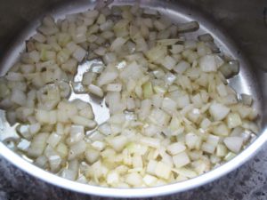 Onions sautéing in olive oil