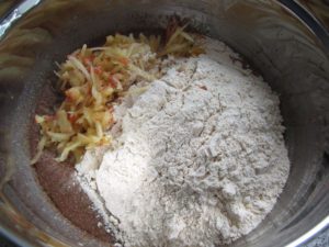 Add flaxseed meal, white whole wheat flour and grated apples