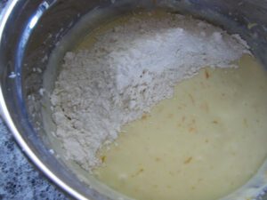 add flour in 3 parts, alternating with yogurt